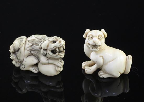 Two Japanese ivory netsuke of a shi-shi and a hound, 19th century, 3.9cm and 3.4cm